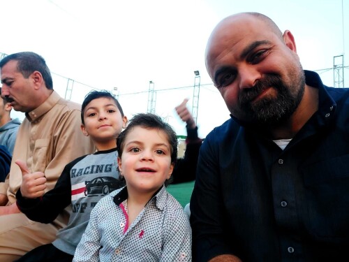 Two-of-the-Al-Najjar-children-Adam-and-Ruslan-with-their-father-Hamdi.jpg